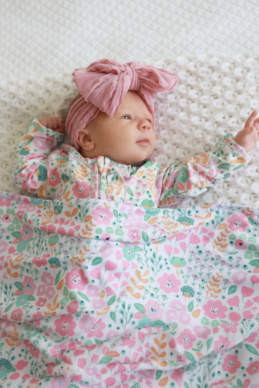 willow's whimsy floral footie for babies with ruffles 