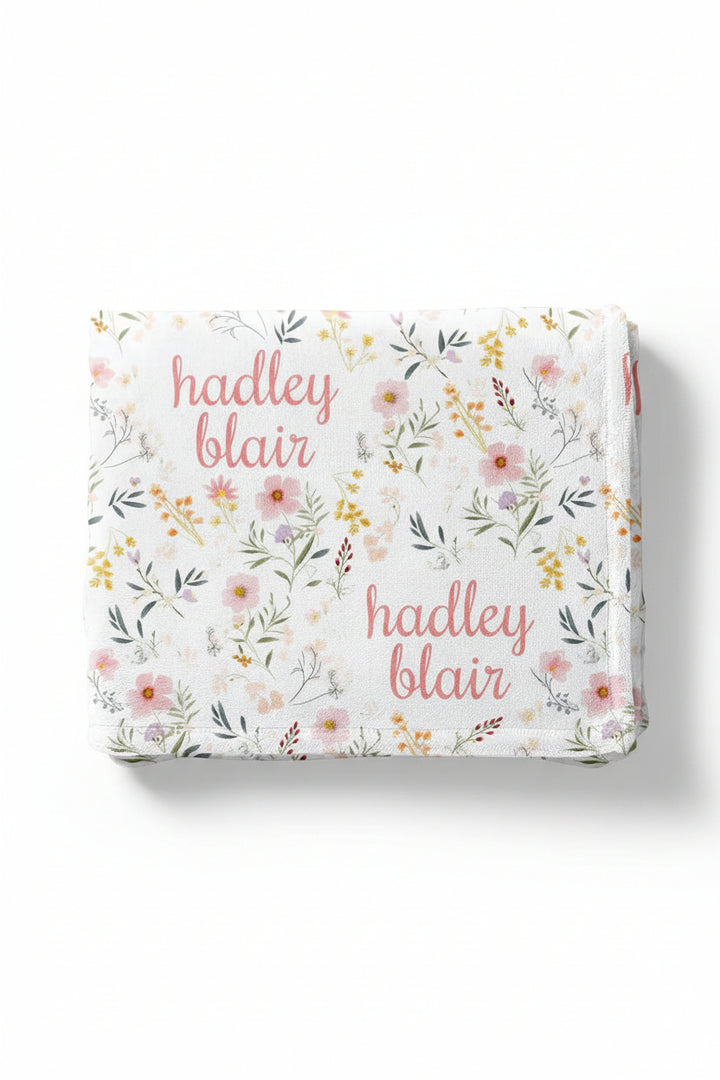 personalized printed floral blanket with dainty wildflowers and scripted name