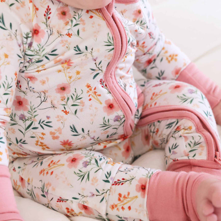 baby pink and watercolor wildflower print convertible romper for toddlers