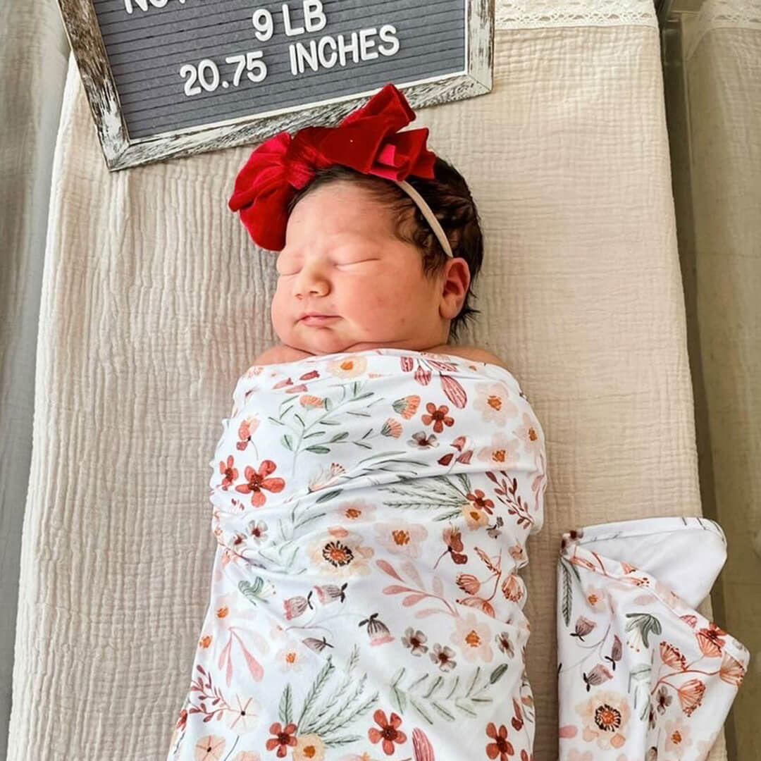 pink and orange floral oversized swaddle for newborns